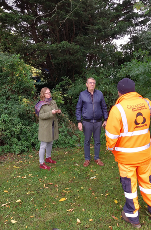 Dr Rebecca Trimnell and Councillor Paul Toleman standing in front of the tree