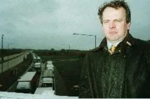 Peter Carroll standing on bridge in front of Operation Stack