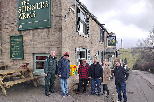 Gareth Farnan-Jones, Robert Cragg and Rob Knotts – Scouthead And Austerlands Community Group; Mick Wilkin, Landlord of the Spinners Arms; and Councillors Alicia Marland and Garth Harkness