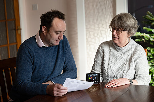 Danny and woman with energy monitor