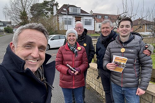 Alex Cole-Hamilton, Susan Murray and Willie Rennie out with Lib Dem Campaigners holding canvass cards