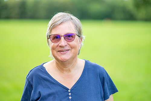 Prue Bray standing in a field