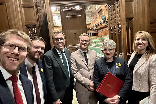 Tom Gordon with other MPs stood outside the House of Commons Chamber