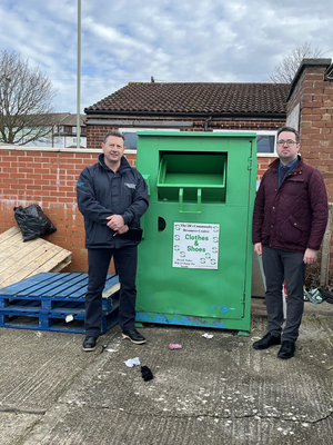 Kevin Lee, environmental crime officer at Gloucester City Council, and Councillor Sebastian Field with the clothes bank at Burns Avenue.