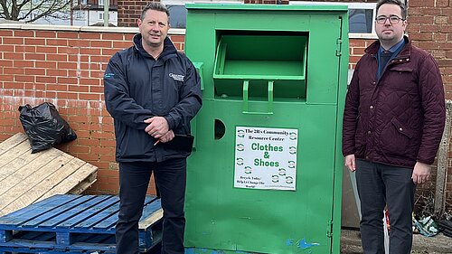 Kevin Lee, environmental crime officer at Gloucester City Council, and Councillor Sebastian Field with the clothes bank at Burns Avenue