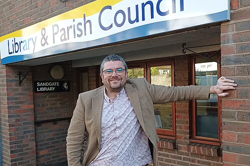 Tim Prater outside Sandgate Library and Sandgate Parish Council office