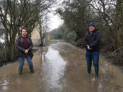 Liam Harries and David Bebbington along one of the flooded paths