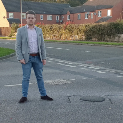 Liam Harries and Quedgeley pothole