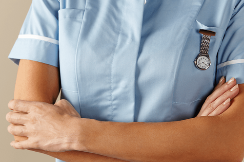 Nurse with crossed arms.